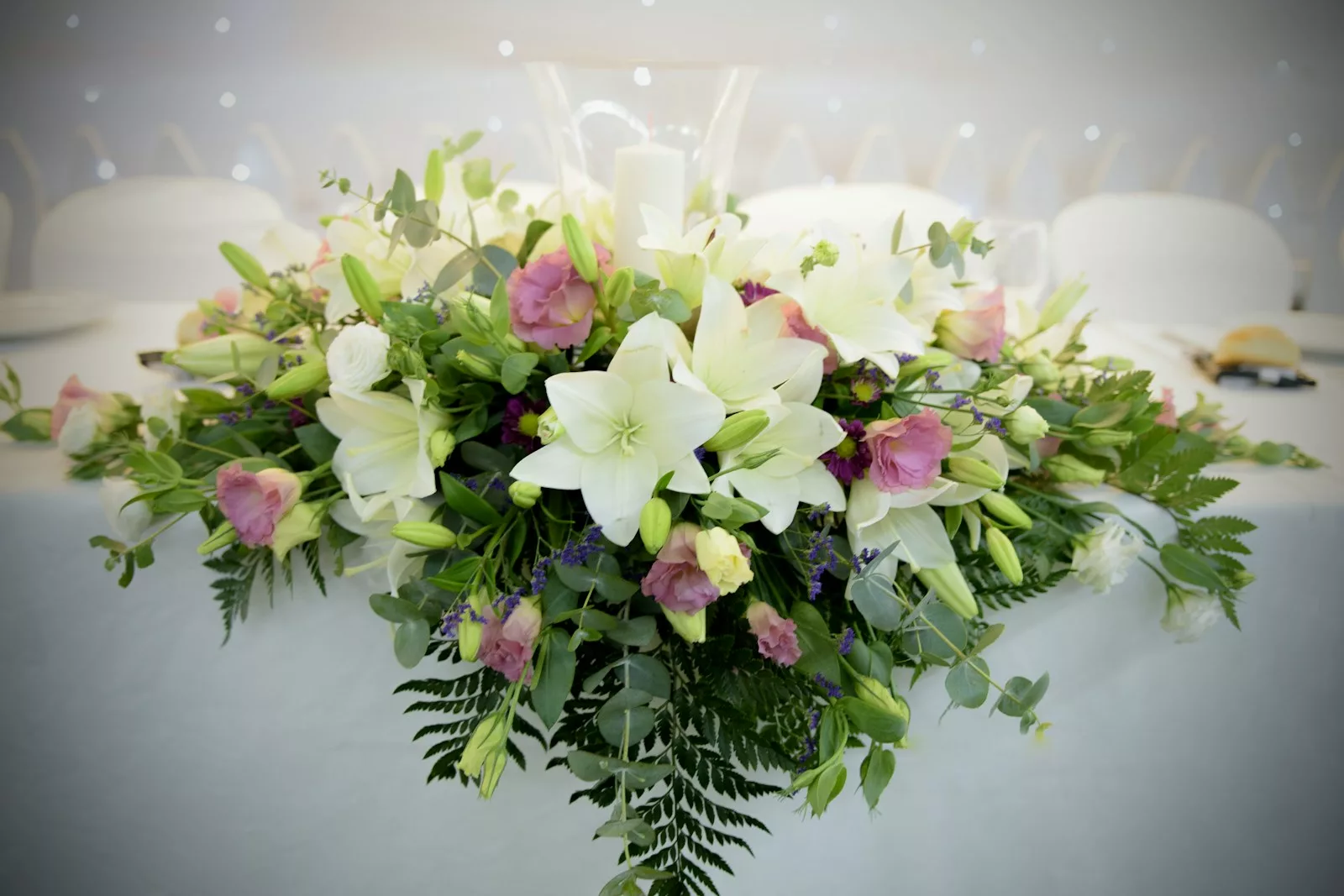 a bouquet of flowers sitting on top of a table